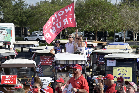 Trump supporters gather to listen to Vice-President Mike Pence at a rally in The Villages, Florida, on Saturday.
