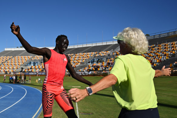 Gout Gout celebrates with coach Di Sheppard.