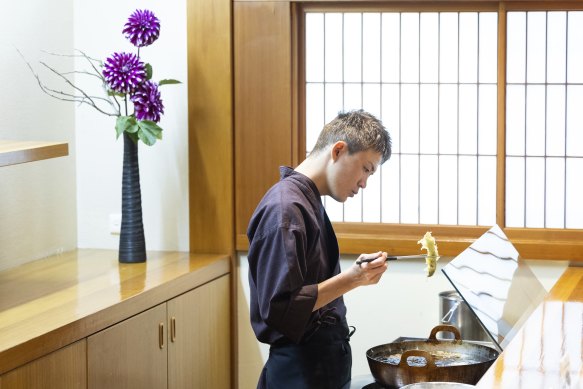 Chef Sadayuki Ogata cooking lunch for the Japanese ambassador.