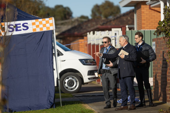 Homicide squad detectives at the scene of a killing in St Albans late on July 6, 2022.