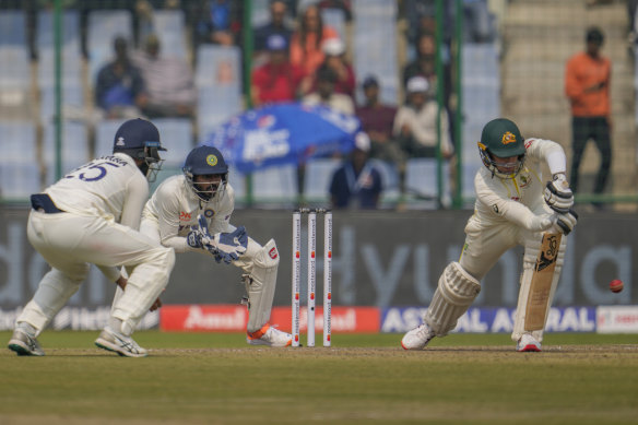 Peter Handscomb stretches well forward in defence during the second Test in Delhi.