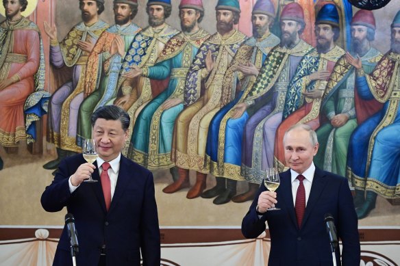 Russian President Vladimir Putin, right, and Chinese President Xi Jinping toast during their dinner at The Palace of the Facets in the Moscow Kremlin, Russia in March.