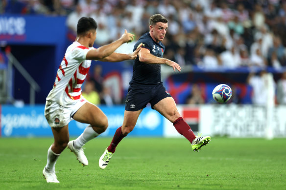 England playmaker George Ford gets a kick away under pressure.