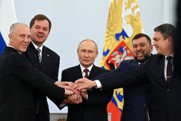 (Left to right) Moscow-appointed head of Kherson Region Vladimir Saldo, Moscow-appointed head of Zaporizhzhia region Yevgeny Balitsky, Russian President Vladimir Putin, Denis Pushilin, leader of self-proclaimed Donetsk People’s Republic and Leonid Pasechnik, leader of self-proclaimed Luhansk People’s Republic.