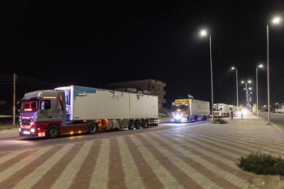 Aid convoy trucks linked up at the Rafah Crossing on October 17.