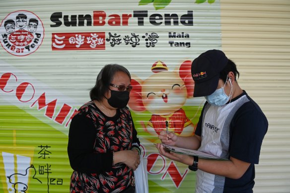 Dylan with his grandmother Aileen, left, who received the AstraZeneca vaccine on Monday. 