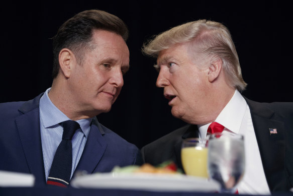 Then-president Donald Trump talks with television producer Mark Burnett at a Washington breakfast in 2017.