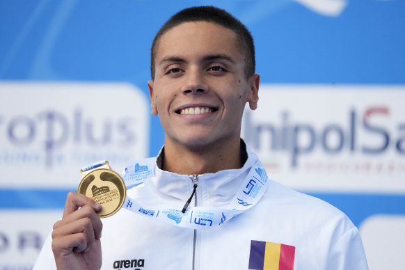 Romania’s David Popovici celebrates after winning the men’s 200m freestyle final at the European Swimming Championships.