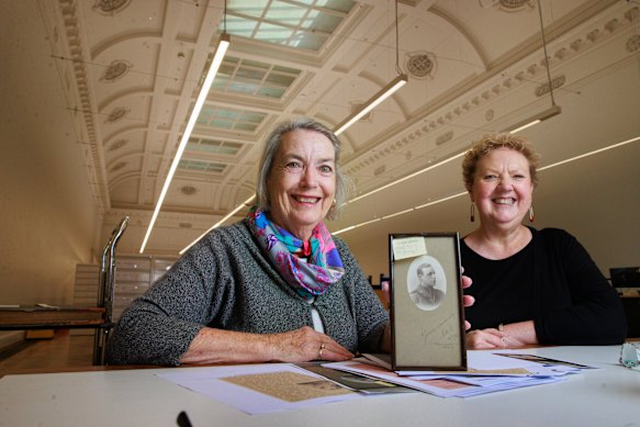 Photo of Dinah Stehr (left) with librarian Ann Copeland and Stehr's World War I soldier grandfather, Harold Ross Clark.