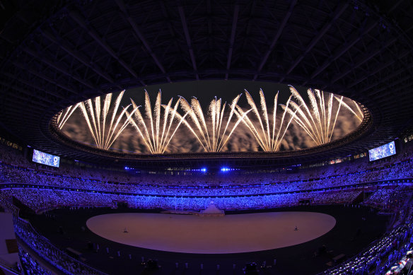 Fireworks light up the stadium at the start of the opening ceremony of the Tokyo Games.