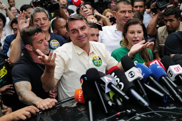 Opposition presidential candidate Senator Flavio Bolsonaro speaks after voting.