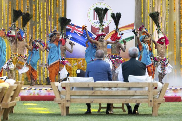 Anthony Albanese and Australia’s High Commissioner to India Barry O’Farrell view a performance during a Holi celebration.