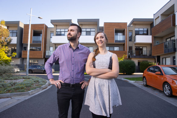 Anja Damen and her partner Christopher Locke outside their Point Cook townhouse.