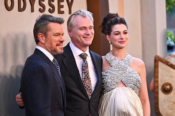 Matt Damon, Christopher Nolan and Anne Hathaway at the premiere of The Odyssey in New York.