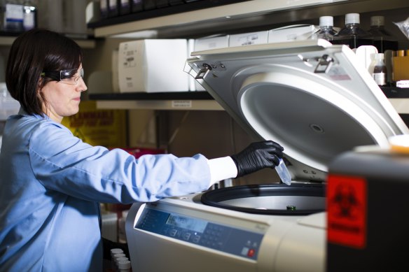 A research associate works at the Moderna Therapeutics Inc. lab in Cambridge, Massachusetts, US, which has had positive results for a vaccine.