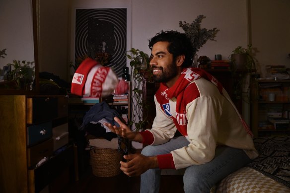 Committed: Swans fan Angud Chawla will dash to Melbourne for the grand final before heading overseas the next day.