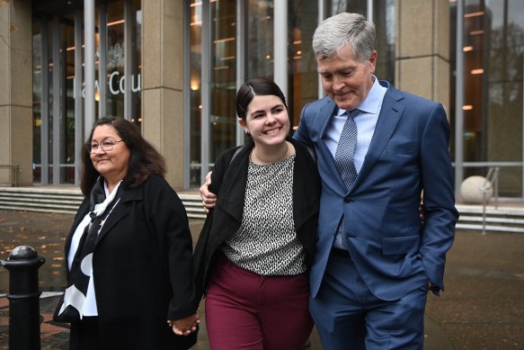 Steve Johnson, brother of Scott Johnson, with his wife Rosemarie (left) and daughter Tessa (centre) after the sentencing of Scott White.