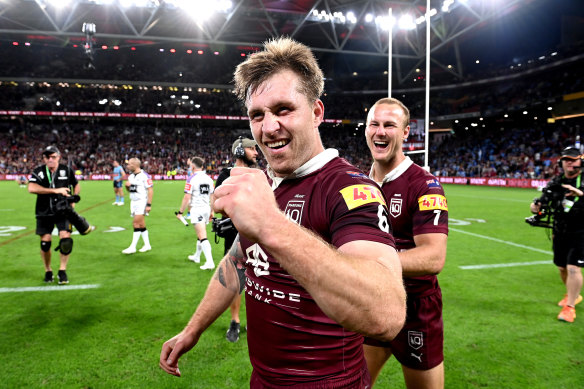 Cameron Munster and Daly Cherry-Evans celebrate Queensland’s Origin II victory.