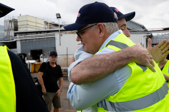 Former prime minister Scott Morrison got a hug at the end of his factory tour in South Lismore, March 9, 2022. 