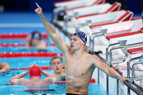 French superstar Leon Marchand celebrates after his golden double.