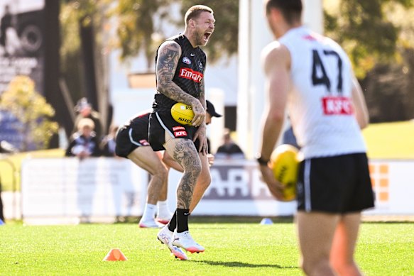 Jordan De Goey has a laugh at Collingwood training on Thursday.