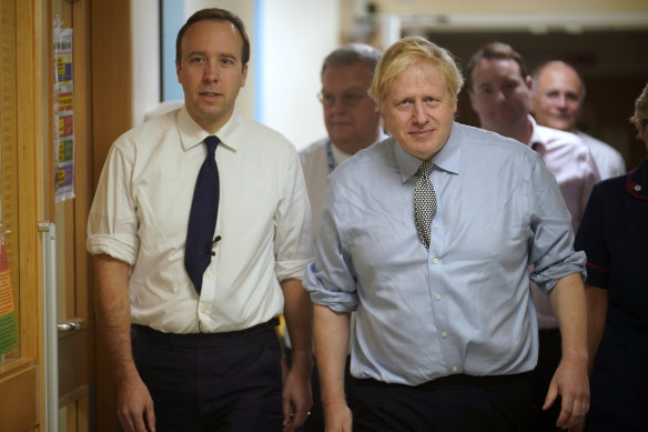 UK Health Secretary Matt Hancock (left) and Prime Minister Boris Johnson.