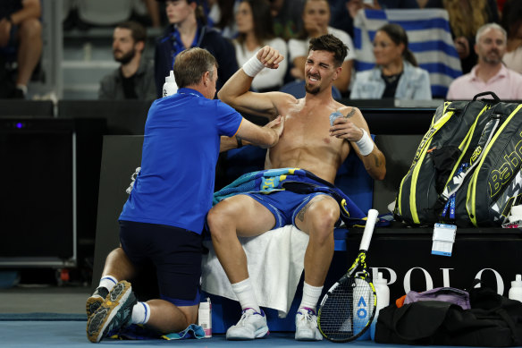 Thanasi Kokkinakis receiving treatment during his round two match.