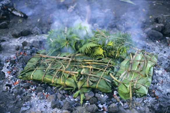 Laplap wrapped with banana leaves  and cooked on coals, Tanna, Vanuatu.