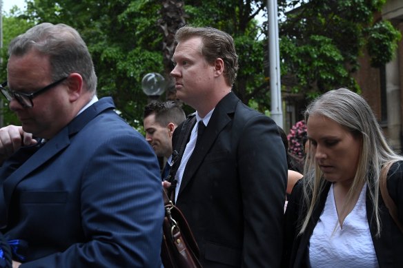 White (centre) will find out on Friday whether he will be detained ahead of sentencing.