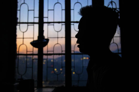 A police officer who fled Myanmar following the military coup is photographed by the AP at undisclosed location bordering Myanmar in March.