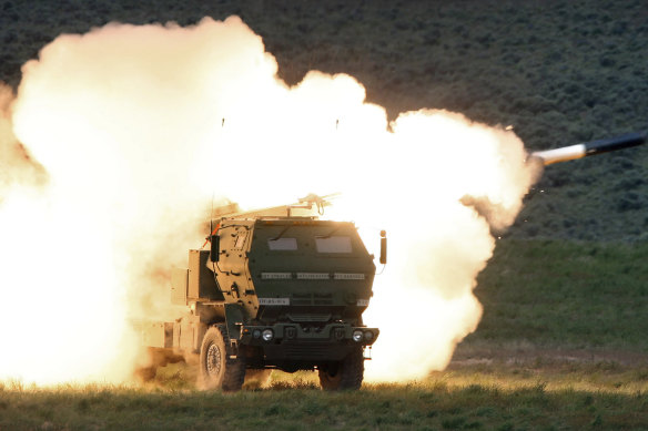 A launch truck fires the HIMARS long-range missile launcher.