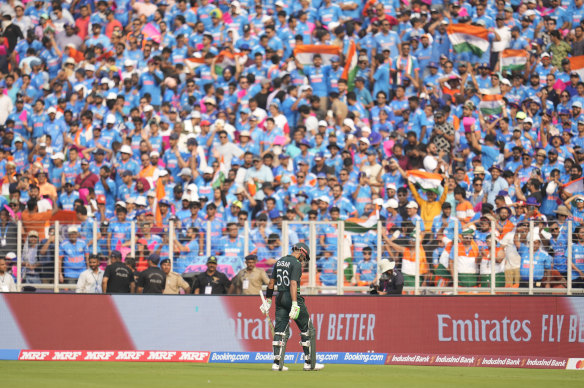 Pakistan’s captain Babar Azam leaves the ground after losing his wicket.