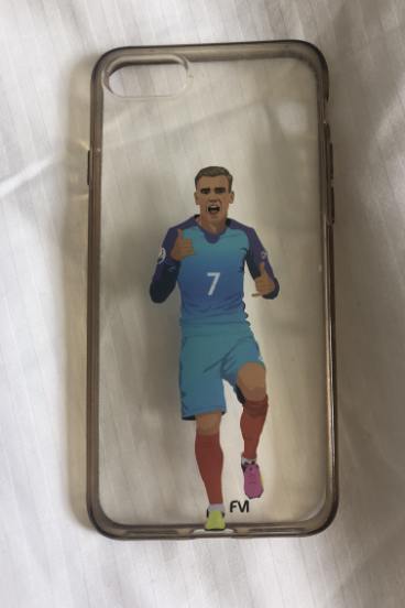 Clubmate: Alex Chidiac's phone cover with an image of Antoine Griezmann, who she has joined at Atletico.