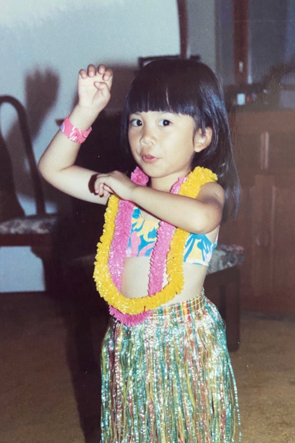 Foo dressed for a Hawaiian recital at pre-school.