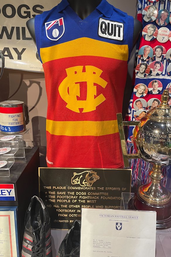 A display in the Western Bulldogs museum reflects on the club’s failed proposal to merge with Fitzroy in 1989.