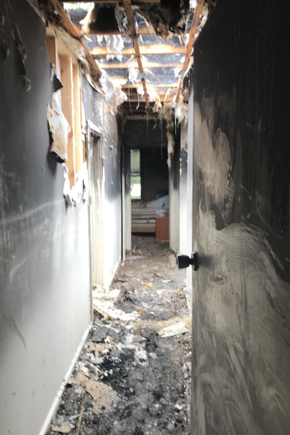 The hallway where firefighters found Neil McMahon in his Melbourne home. 