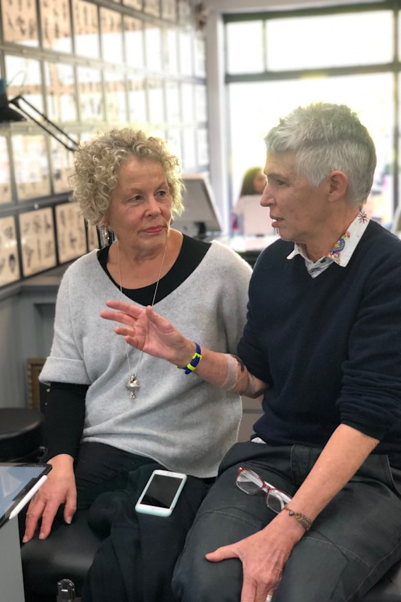 Sandi Smyth and Andrea Phelan waiting for their tattoos.