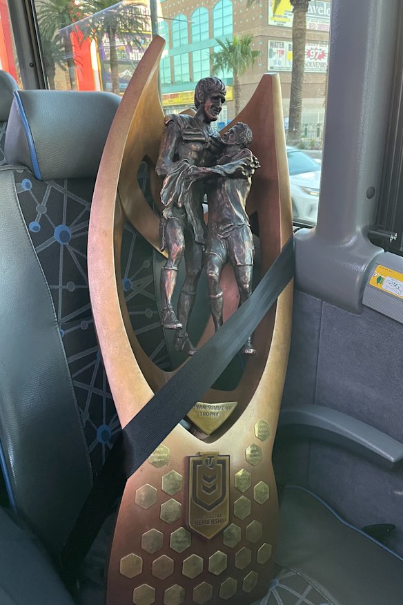 The Provan-Summons Trophy, safely strapped into a seat in Las Vegas.