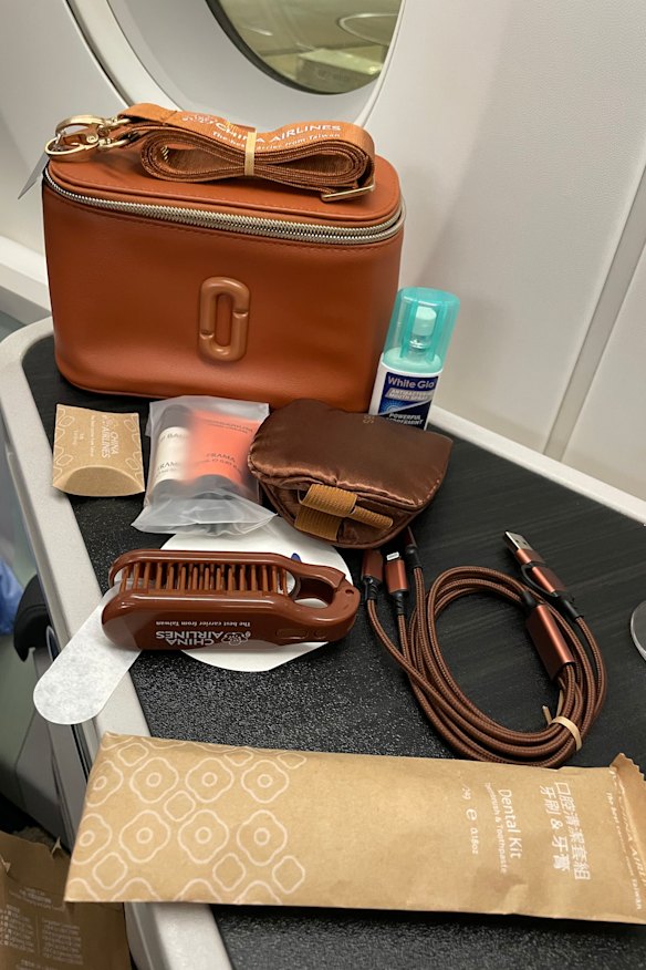 The amenity kit with a multi-adapter charging cable.