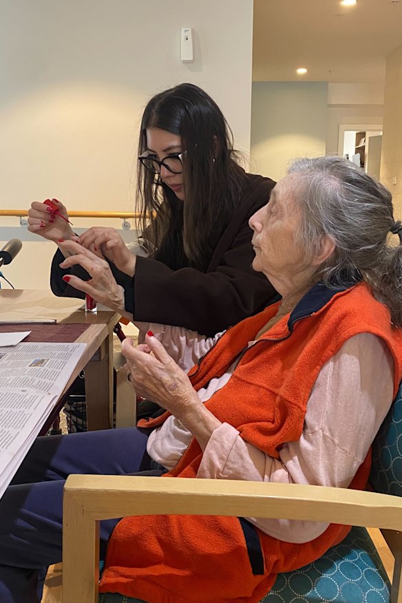 Painting Mama’s nails in the nursing home.