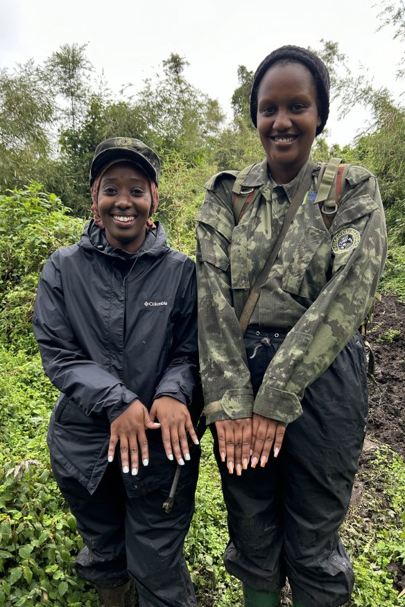 Young guides show off their nails.