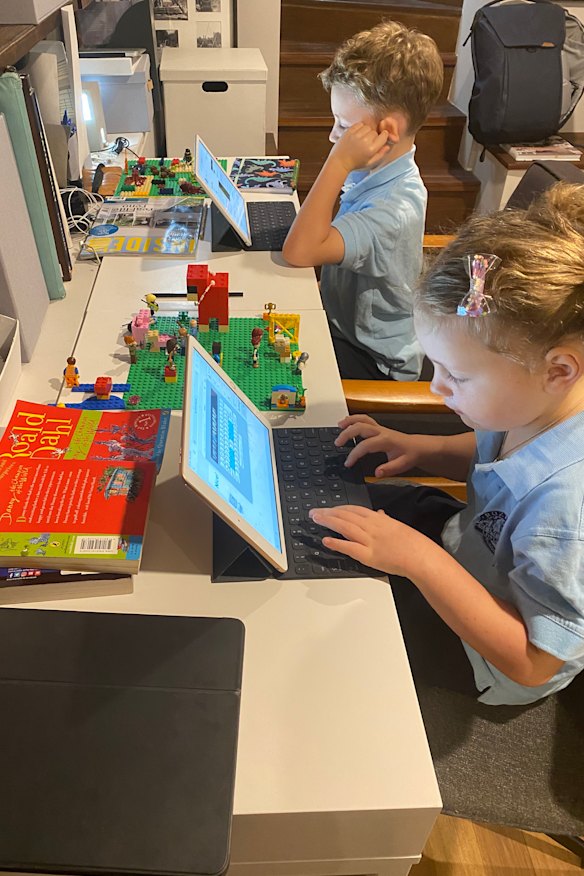 Kate Cooper's kids in their newly-named 'Lilyfield Grammar School' as they work from home.