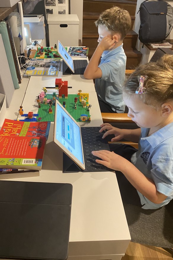 Kate Cooper's kids in their newly-named 'Lilyfield Grammar School' as they work from home.