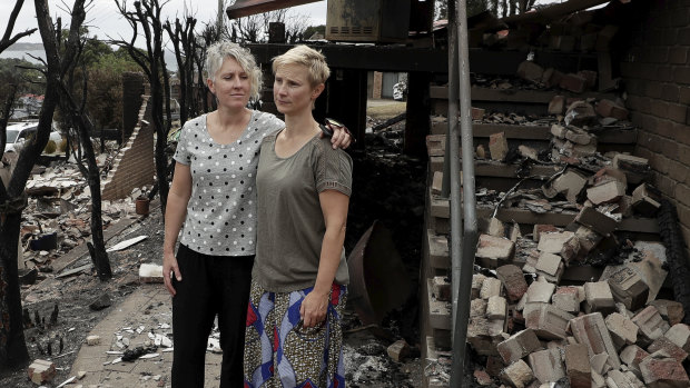 Deborah Naeve and Ingrid Mitchell had sold their home - but not settled - and bought another which was also affected by the fire.