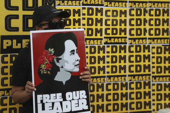 Anti-coup protesters call for the release of Aung San Suu Kyi.
