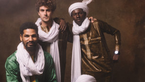 Mdou Moctar (left), with band: rhythm guitarist Ahmoudou Madassane, drummer Souleymane Ibrahim, and bassist Mikey Coltun.