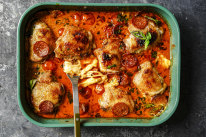 Tip: Instead of a roasting tray (pictured), use an ovenproof frypan to turn this pizza-inspired chicken bake into a one-pan wonder.