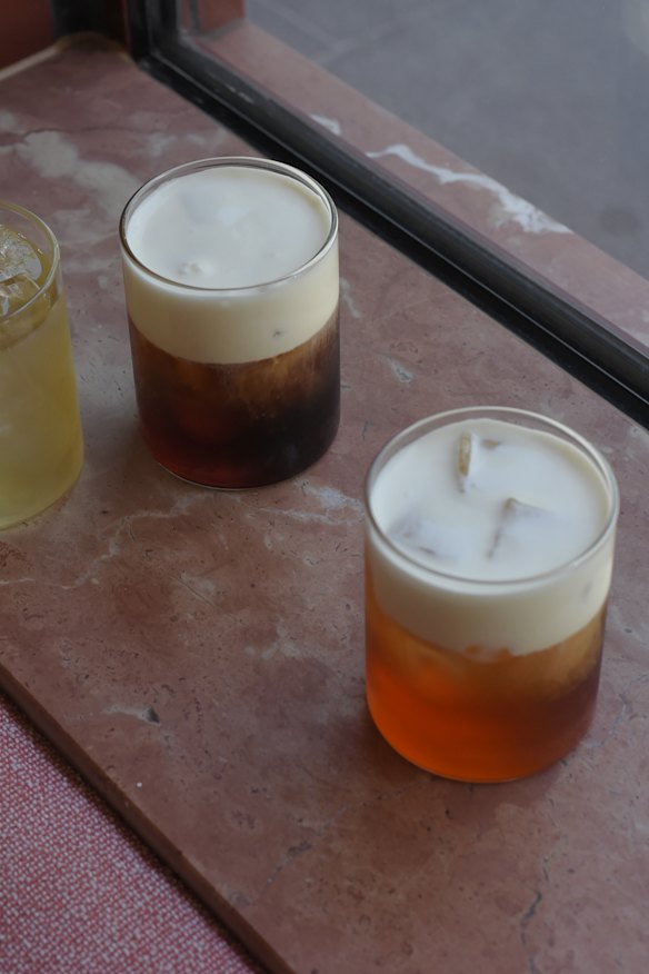 ACoffee’s signature einspanner (left) and cameo caramel drinks.