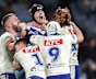 The Bulldogs celebrate after a Matt Burton field goal clinched a golden point win over Cronulla last season.