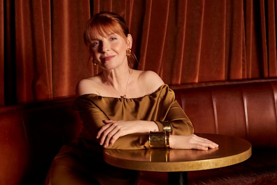 Jacqueline McKenzie wears Bianca Spender dress. Dinosaur Designs jewellery.